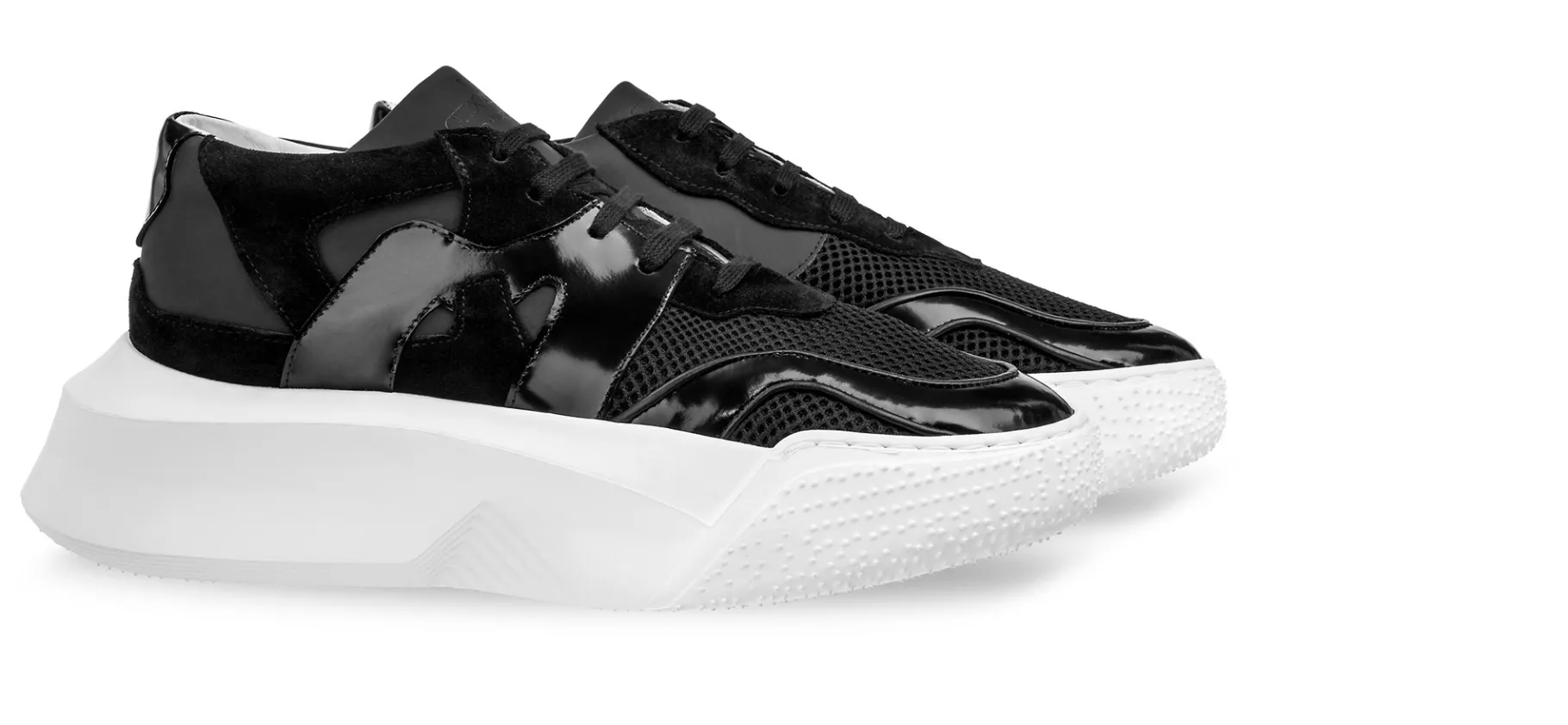 tyga__chunky_sneakers_in__0.webp Uomo GUIDOMAGGI Sneakers>Tyga - chunky sneakers in Mix Pelle/Tessuto Da 6 a 10 cm più alto