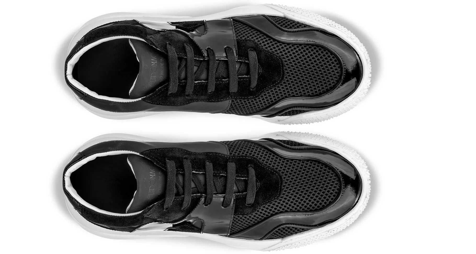 tyga__chunky_sneakers_in__6.webp Uomo GUIDOMAGGI Sneakers>Tyga - chunky sneakers in Mix Pelle/Tessuto Da 6 a 10 cm più alto